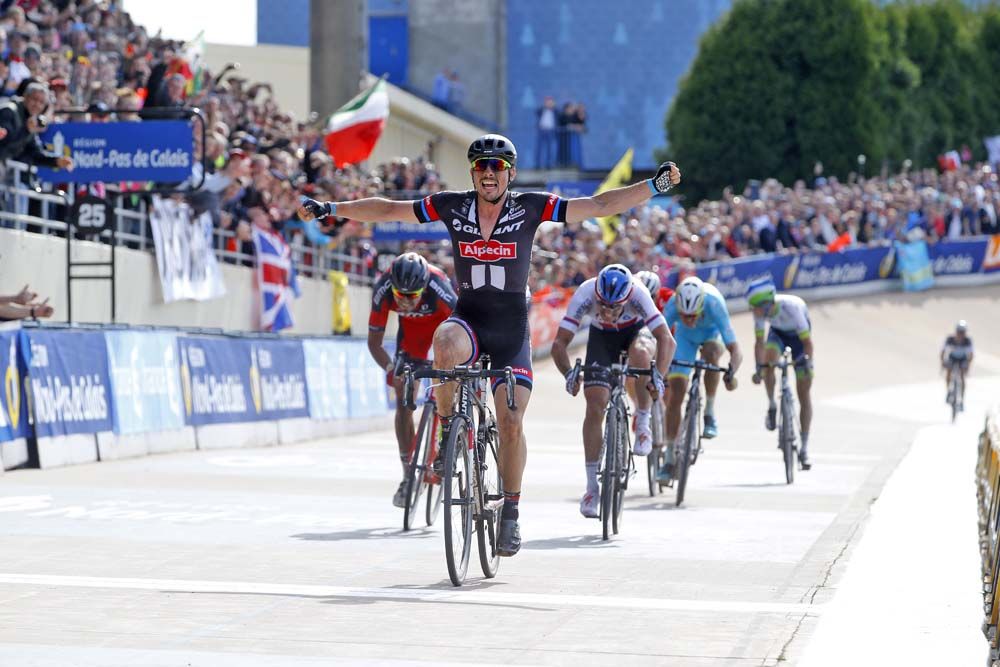 John Degenkolb (Giant-Alpecin) raises his arms in celebration