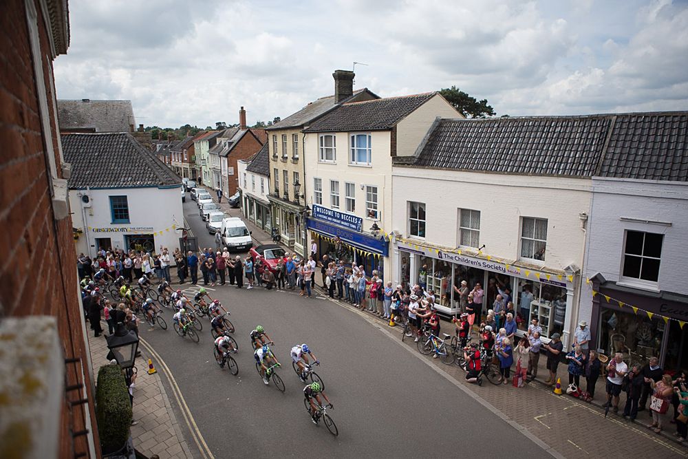 The peloton approaches the Beccles high street during the Aviva Women's Tour 2016 - Stage 1