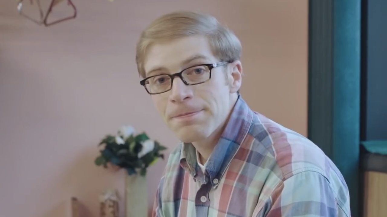 Joe Pera looking into camera in ad for Season 2 of Joe Pera Talks With You