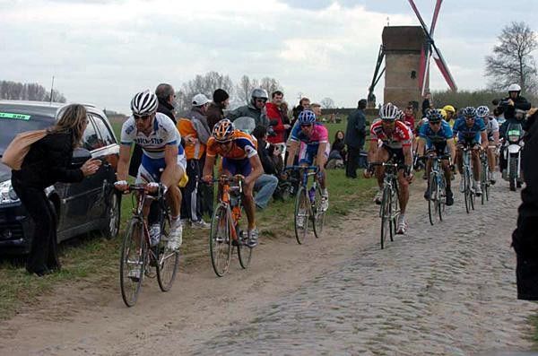 Tom Boonen (Quick.Step) rides the gutter along this section of cobbles