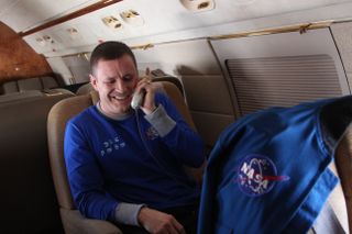 NASA astronaut Jack Fischer talks on the phone with President Donald Trump while flying to Johnson Space Center's Ellington Field in Houston on Sunday (Sept. 3).