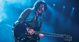 Richard Fortus with his signature Gretsch Falcon – the Guns N' Roses' guitarist's weapon of choice for the rock giants' stadium dates.
