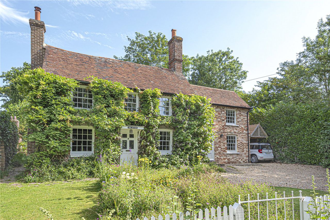 Vine Cottage in West Sussex, for sale at £825,000.