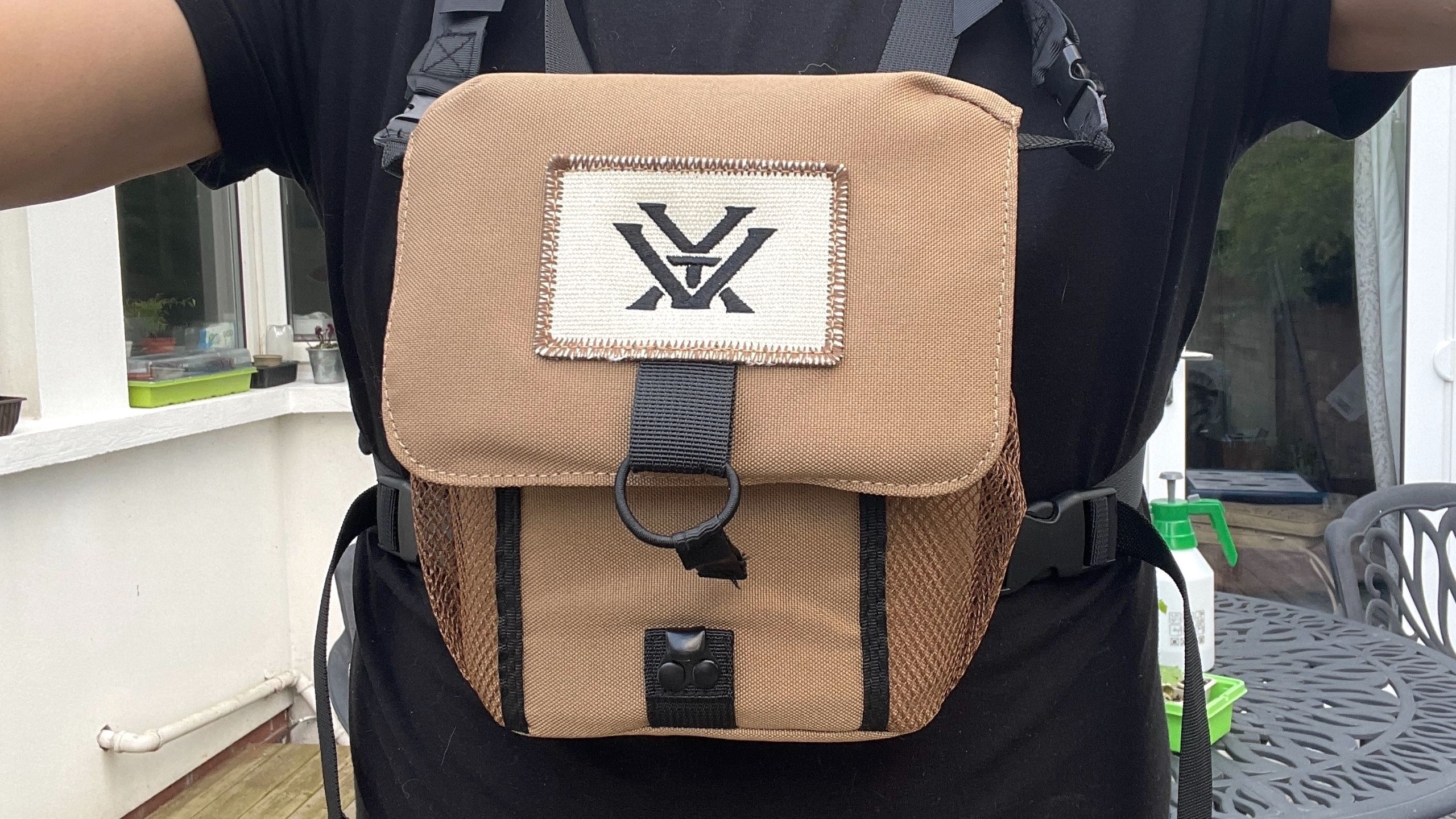 Image showing the Vortex 10x50 Crossfire HD case with chest harness.
