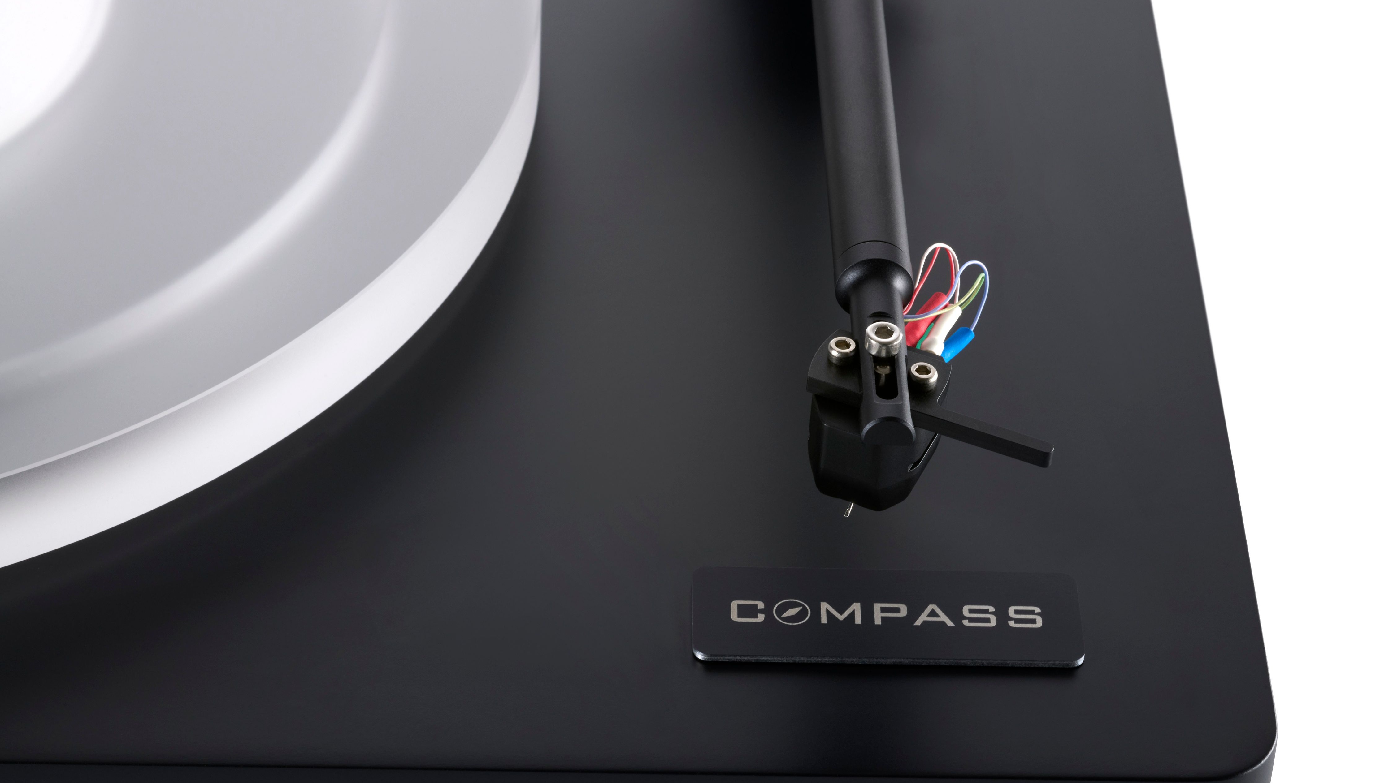 Clearaudio Compass black turntable logo and tonearm close-up shot