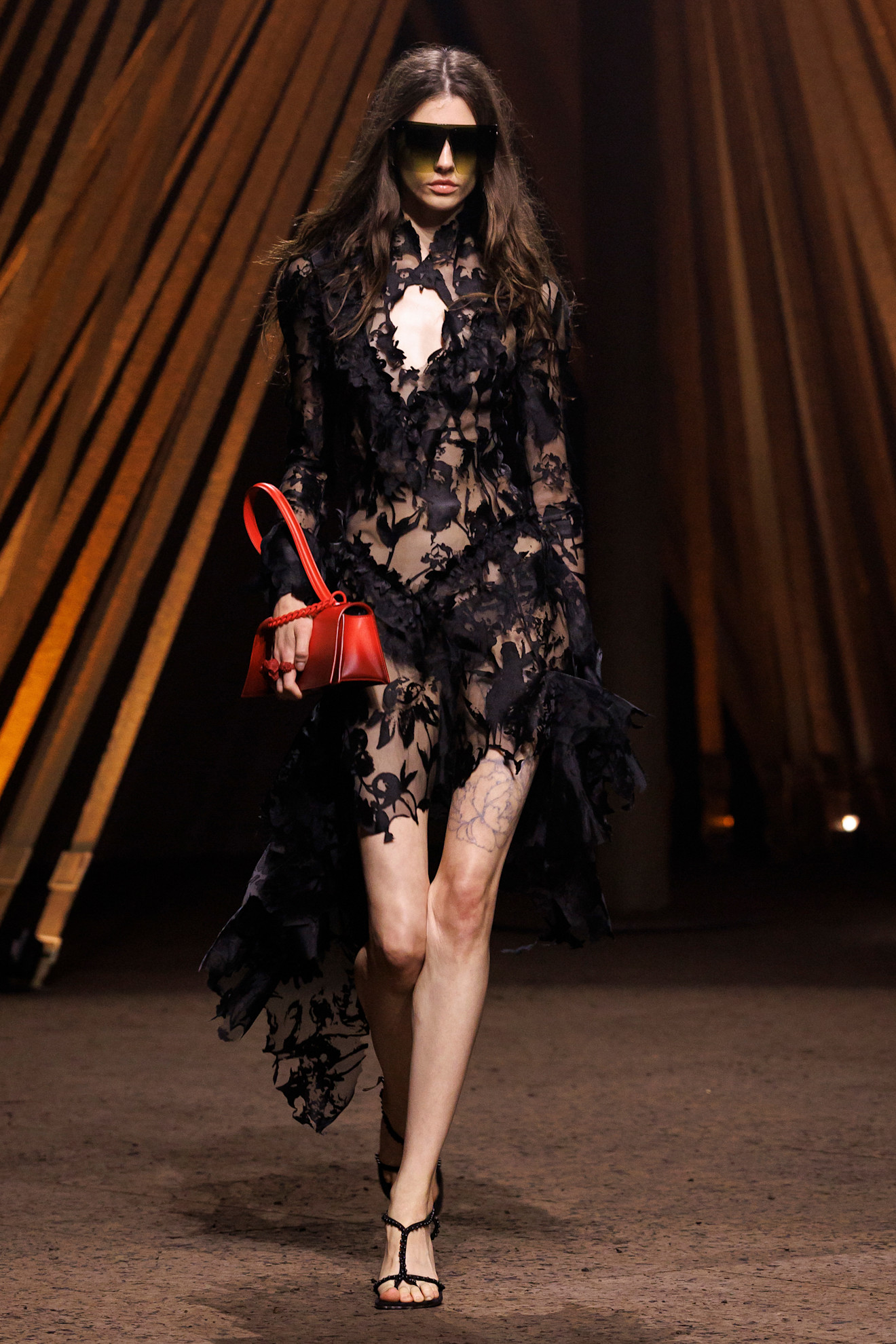 A model wore Margot Robbie's naked little black dress down the Alexander McQueen Spring 2026 runway