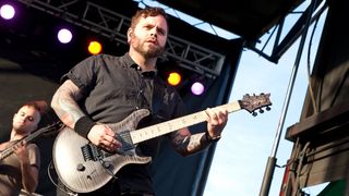 Guitarist Dustie Waring of Between the Buried and Me performs during 2016 Carolina Rebellion at Charlotte Motor Speedway on May 6, 2016 in Concord, North Carolina.