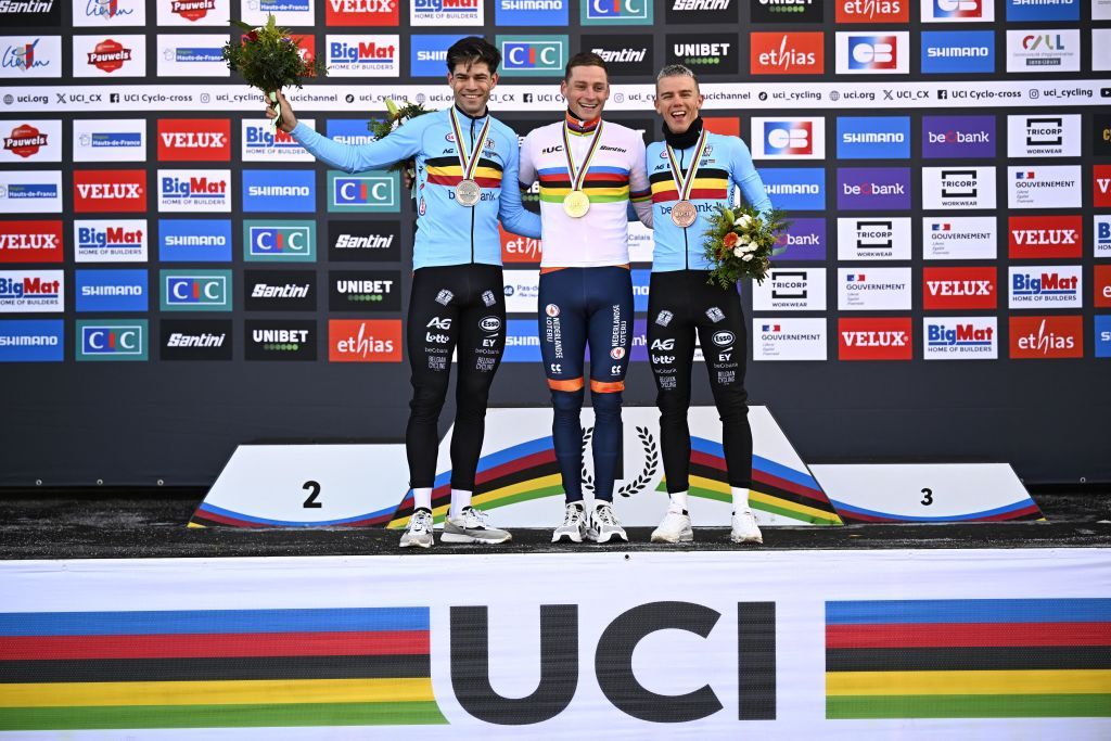 Belgian Wout van Aert, Dutch Mathieu Van Der Poel and Belgian Thibau Nys pictured on the podium after the elite men competition of the UCI cyclocross World Championship, in Lievin, France, Sunday 02 February 2025. The world championships are taking place from 31 January until 02 February.
BELGA PHOTO JASPER JACOBS (Photo by JASPER JACOBS / BELGA MAG / Belga via AFP)