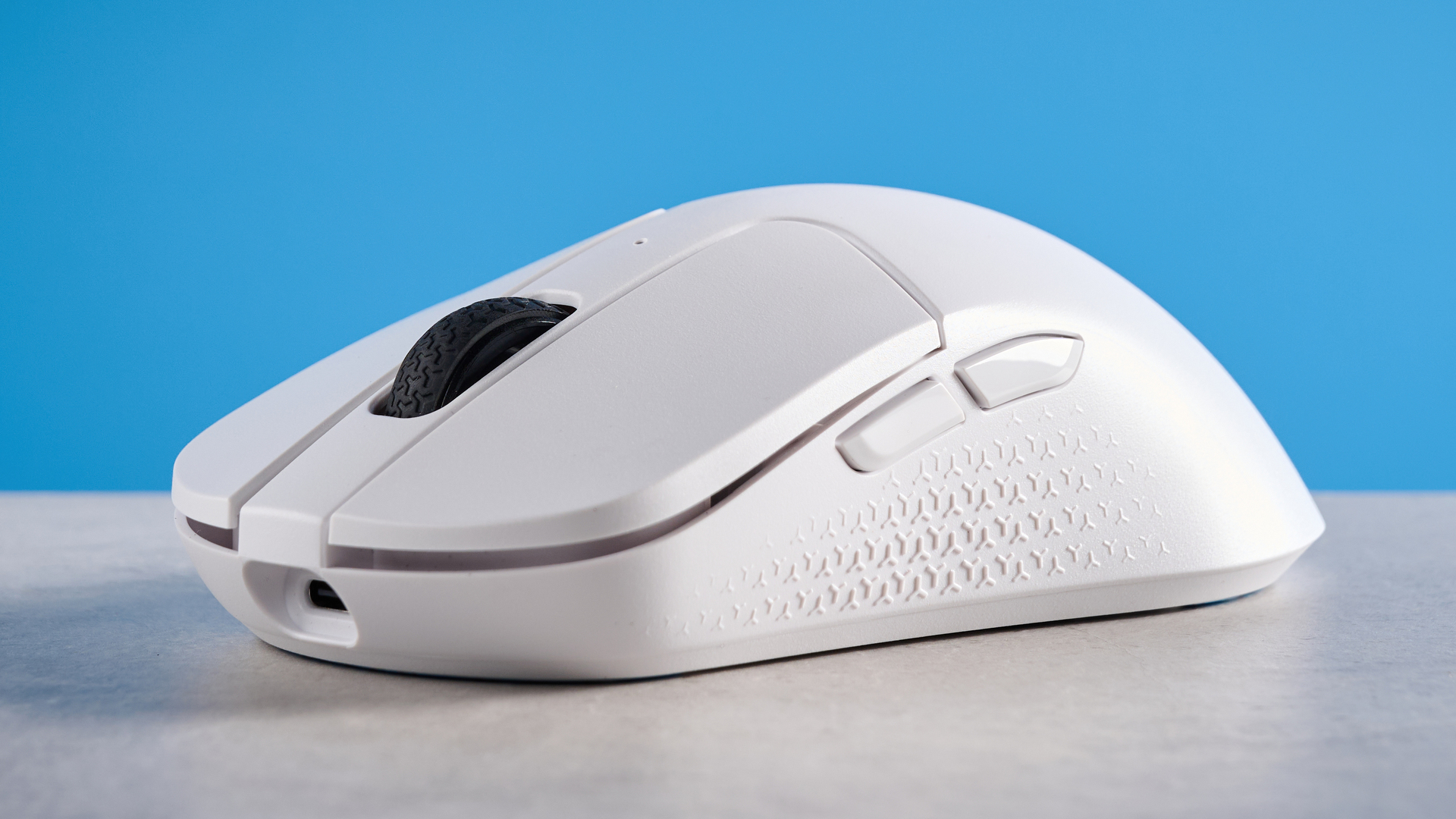 A white Keychron M3 Mini 8K gaming mouse