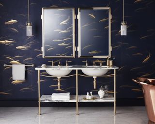 A bathroom with a double open vanity with a marble shelf, and a dark blue wallpaper printed with a fish pattern