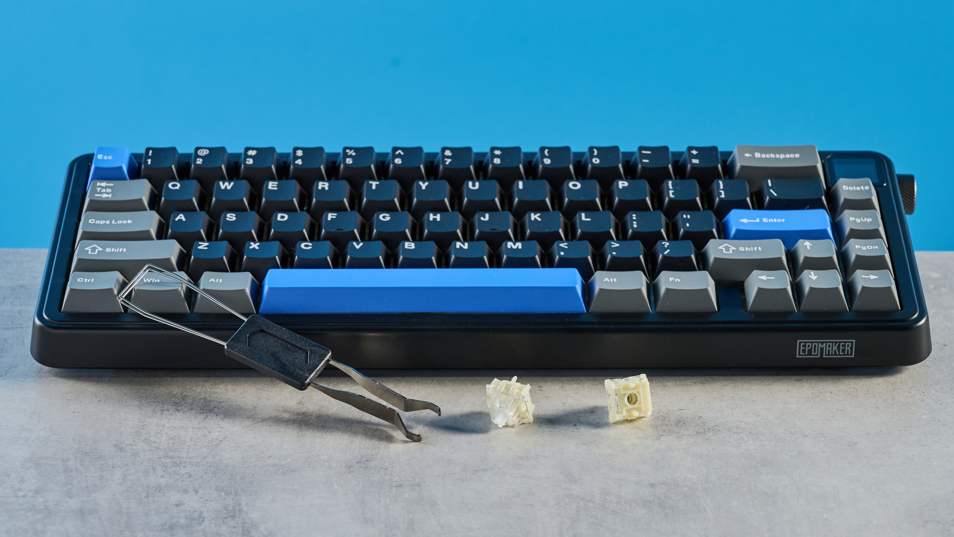 A black, gray and blue Epomaker HE65 Mag magnetic keyboard with Hall Effect switches
