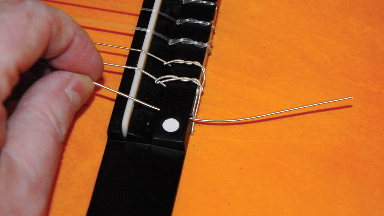 Guitar setup how to restring a nylonstring classical guitar MusicRadar