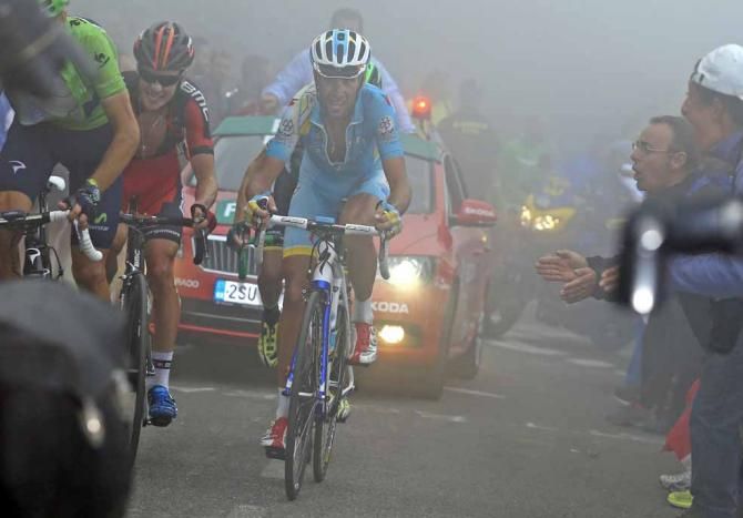 Vincenzo Nibali (Astana) watches his hopes of Vuelta a Espana victory disappear in the mist of the Angliru.