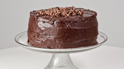 Chocolate gâteau on glass stand