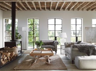 country living room ideas - with beamed ceiling