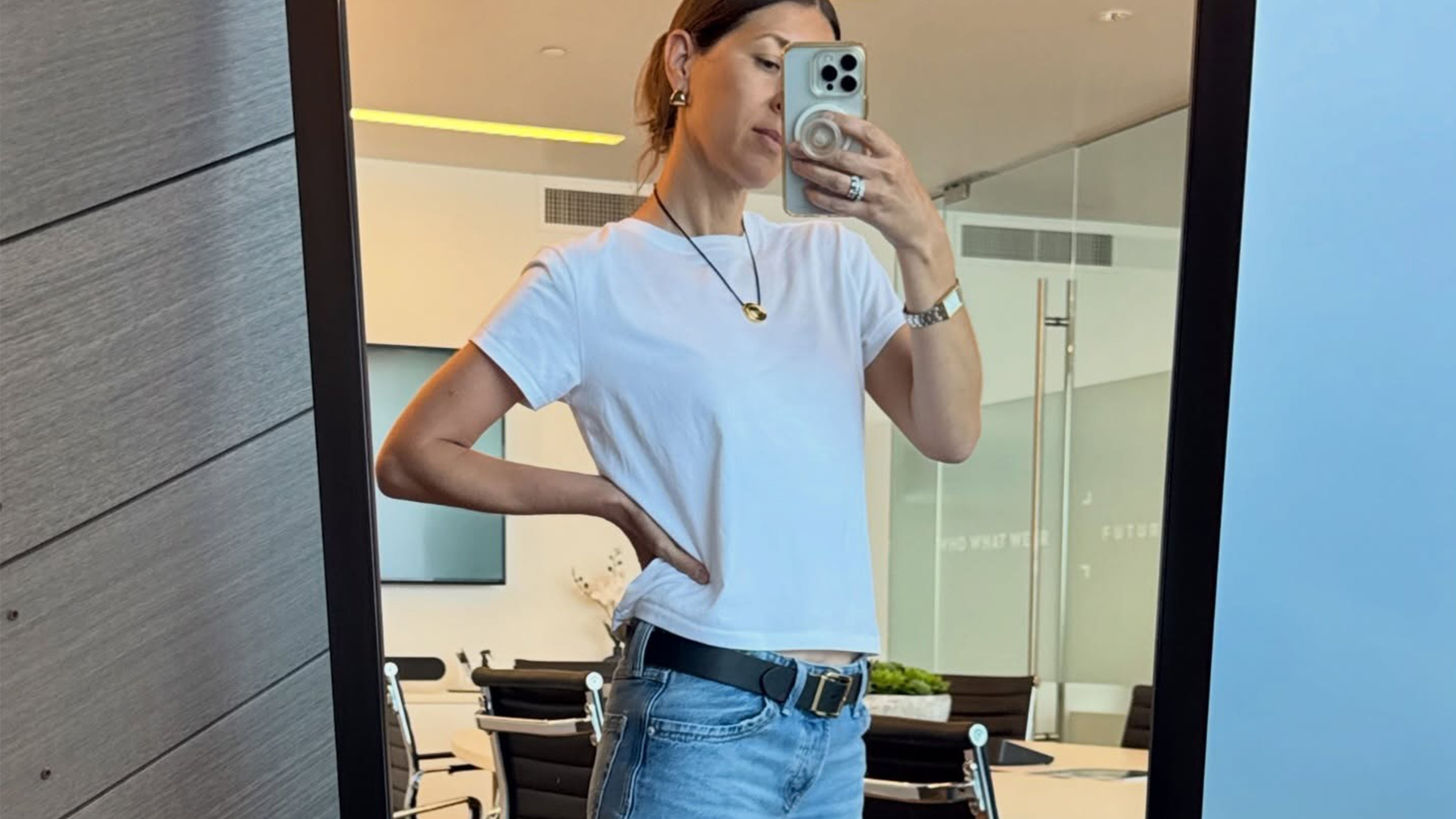 Woman in a white tee and jeans