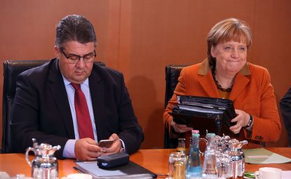 German Chancellor Angela Merkel (CDU, R) and Vice Chancellor and Economy and Energy Minister Sigmar Gabriel (SPD) 