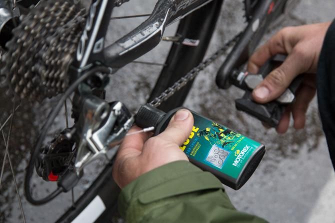 Prior to what was expected to be a soaker of a stage, mechanics liberally applied extra protection to chains.