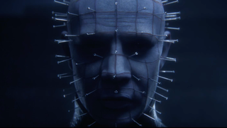 Pinhead glowers in the shadows