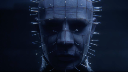 Pinhead glowers in the shadows