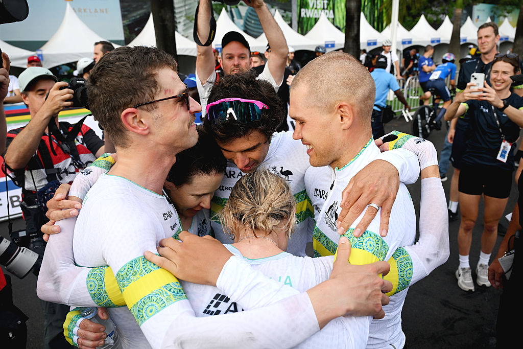 Gold medalists Michael Matthews, Luke Plapp, Jay Vine, Brodie Chapman, Amanda Spratt and Team Australia react after the 98th UCI Cycling World Championships Kigali 2025