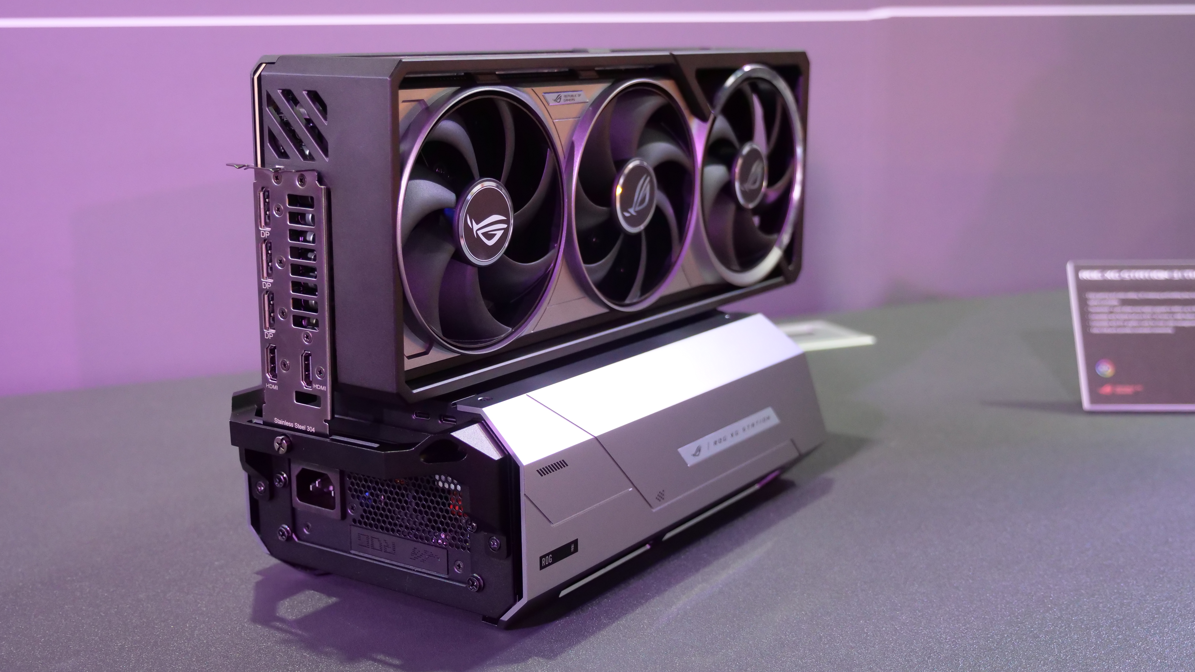 Asus ROG XG Station 3 on a desktop at Computex 2025, image shows the eGPU fitted with a desktop ROG-branded graphics card..