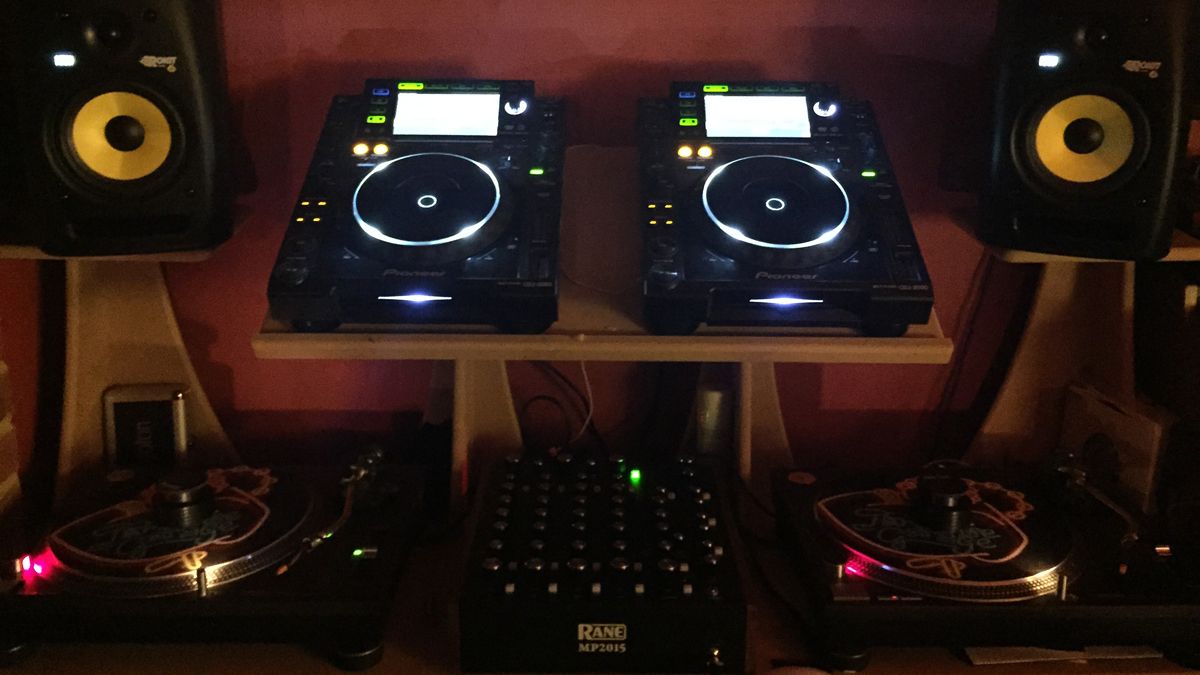 DJ rig: Rane rotary mixer, 1210s and CDJs.