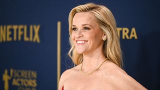 Reese Witherspoon smiles during the photocall for the 30th annual Screen Actors Guild Awards