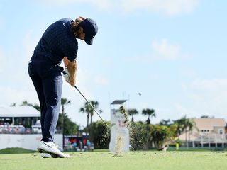 Tommy Fleetwood hitting a tee shot with perfect extension