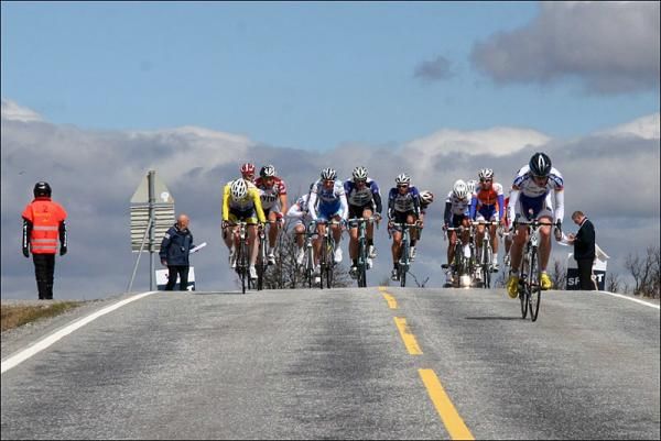 Riders pass through an intermediate sprint line during stage 2.