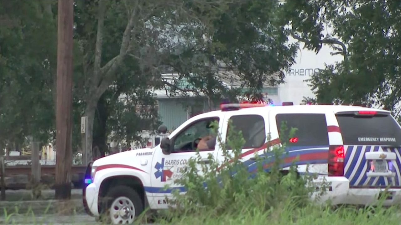 A Harris County sheriffs deputy sits outside an Arkema chemical plant