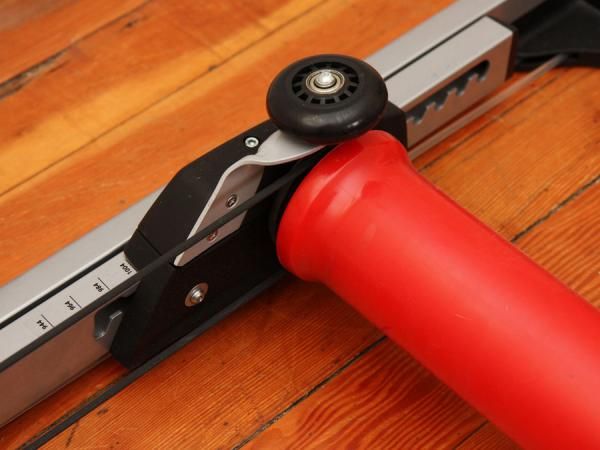 It's a seemingly small thing but it makes a big difference - the small bumper wheels on either side of the forward drum makes it much tougher to ride off of the sides of Elite's E-motion rollers.