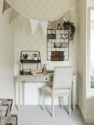 home office/bedroom desk with noticeboard, wallpaper, bunting, desk accessories, chair, baskets