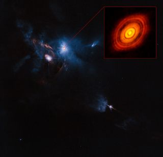 This composite image showing the young star HL Tau and its surroundings uses data from the ALMA radio telescope array (enlarged in box at upper right) and NASA's Hubble Space Telescope.