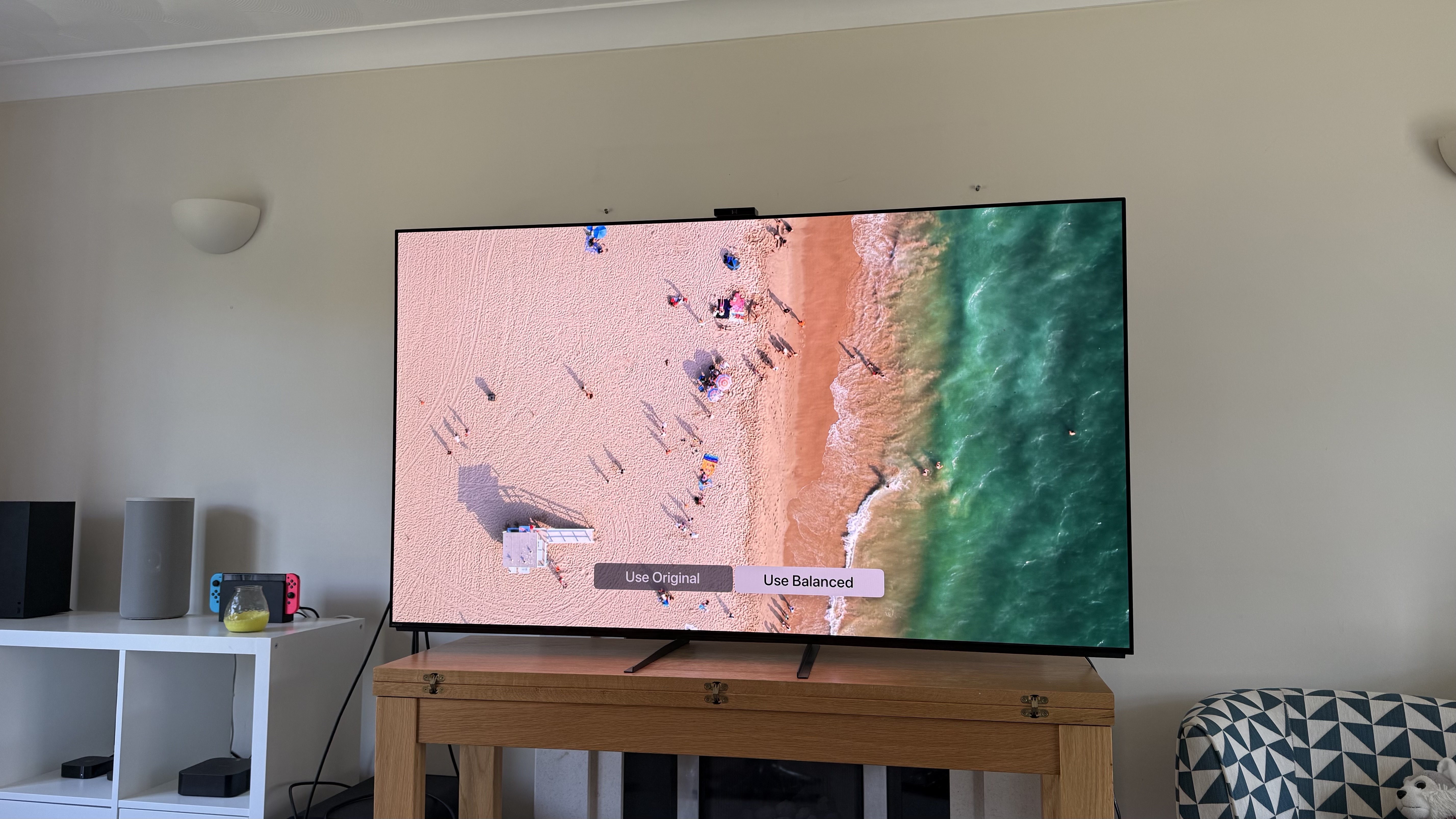 A beach scene on a TV with Apple's Colour Balance user interface