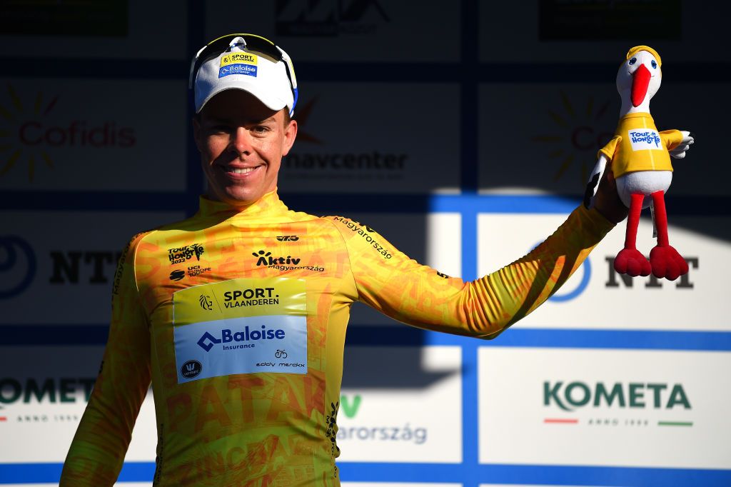 HAJDSZOBOSZL HUNGARY MAY 12 Jens Reynders of Belgium and Team Sport Vlaanderen Baloise celebrates at podium as Yellow Leader Jersey winner during the 43rd Tour de Hongrie 2022 Stage 2 a 192km stage from Karcag to Hajdszoboszl tourdehongrie on May 12 2022 in Hajdszoboszl Hungary Photo by Dario BelingheriGetty Images
