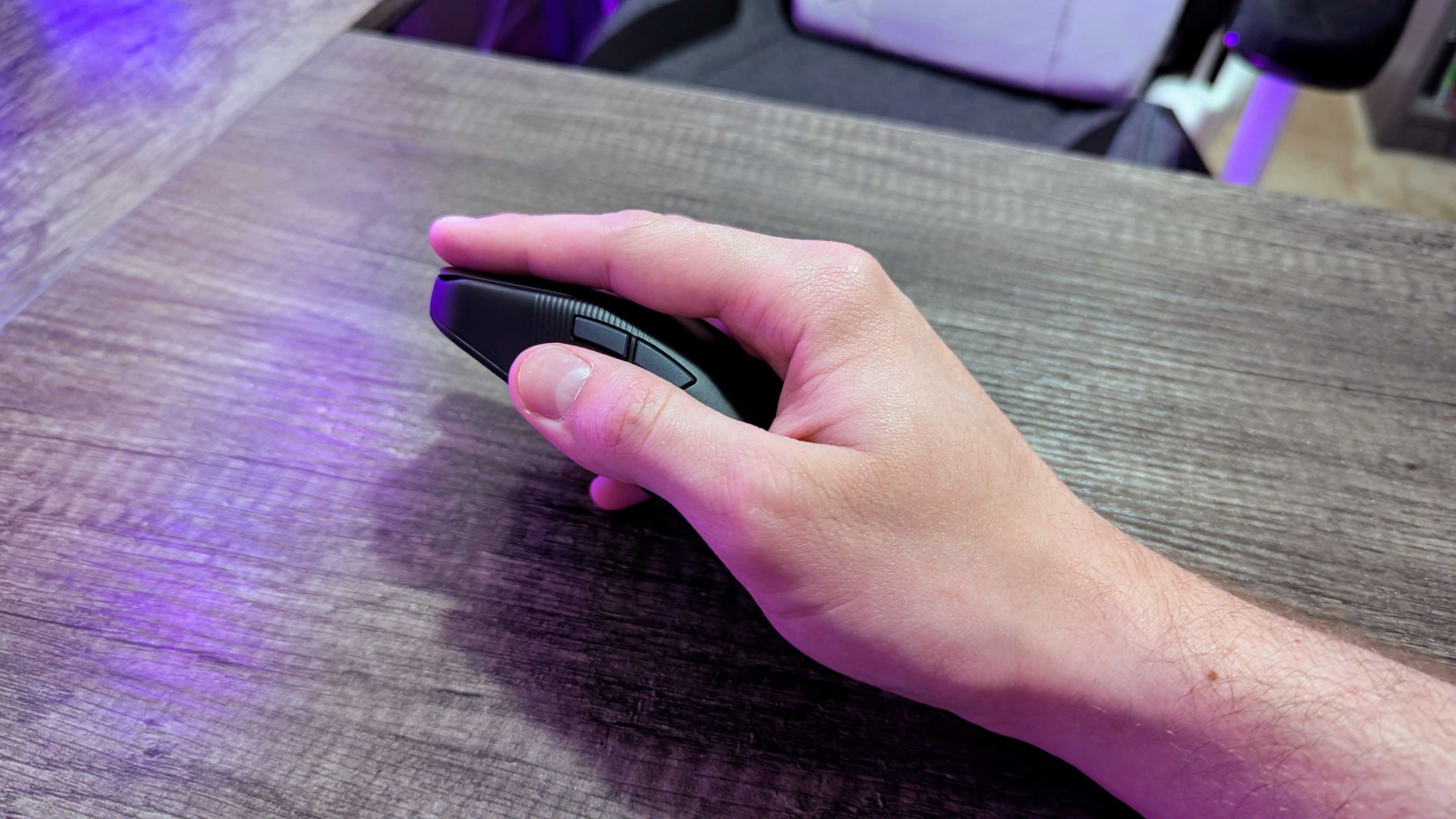 Image of the ASUS ROG Harpe Ace Mini wireless gaming mouse.