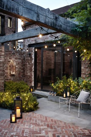 patio lighting ideas: festoon lights over patio lights4fun