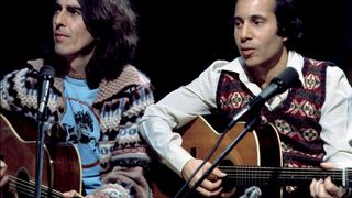 Paul SIMON and George HARRISON; with Paul Simon, performing on Saturday Night Live in 1976