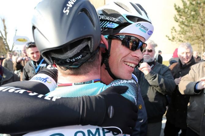 Iljo Keisse (Omega Pharma-QuickStep) embraces stage 2 winner and teammate Mark Cavendish