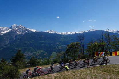 The pack rides during the 14th stage of the Giro d'Italia 2026 - Tour of Italy cycling race between Aosta and Pila (Gressan), Italy, on May 23, 2026.