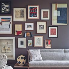 Living room with dark grey walls and gallery wall 