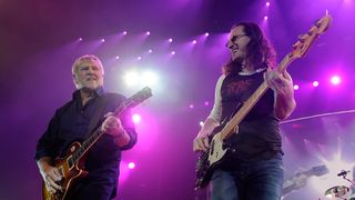  (L-R) Rush guitarist Alex Lifeson and singer/bassist Geddy Lee perform at the MGM Grand Garden Arena during a stop of the band's Time Machine Tour August 14, 2010 in Las Vegas, Nevada