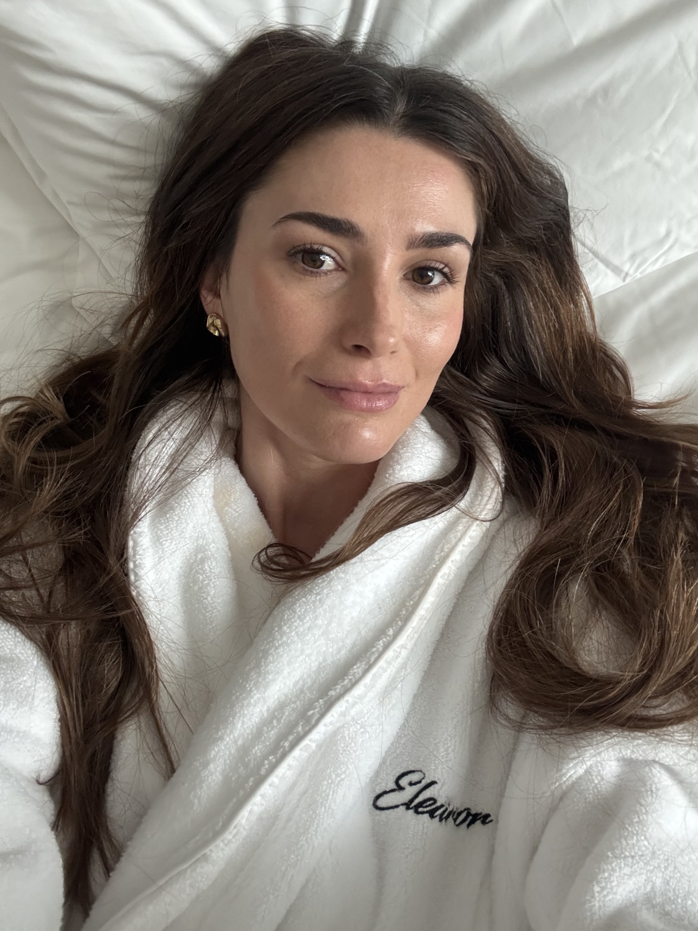 A selfie of beauty editor Eleanor Vousden wearing a white dressing gown