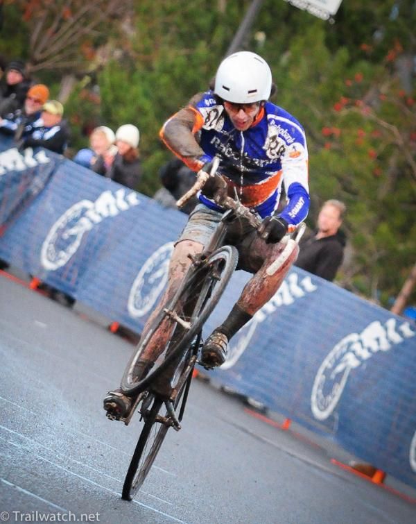 Adam Craig (Giant-Rabobank) does a wheelie over the finish.