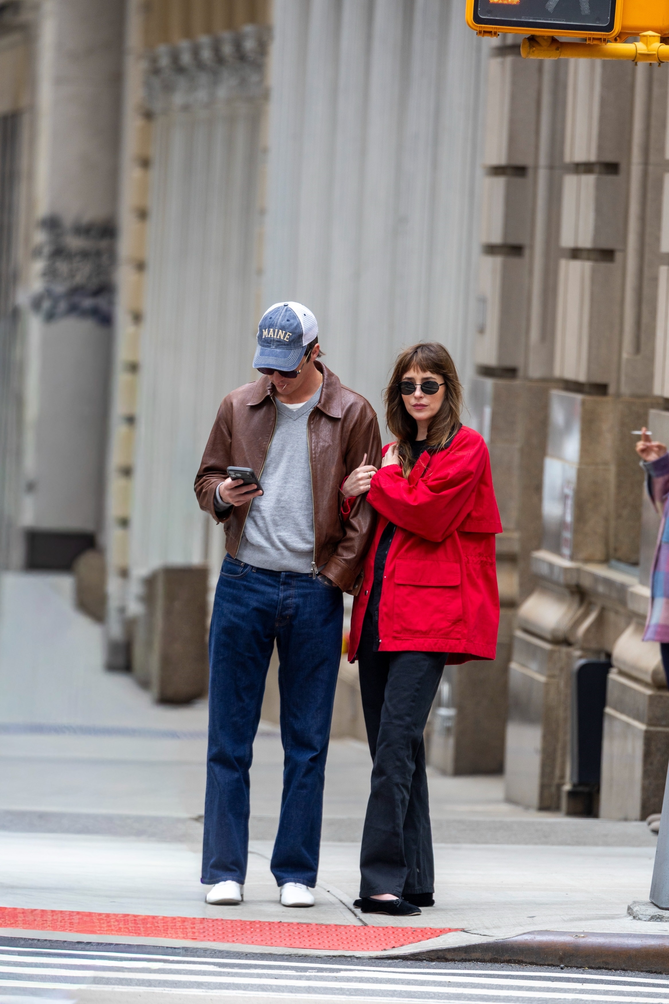 Dakota Johnson wore a strawberry-red barn jacket trend on a date with rumored boyfriend Role Model