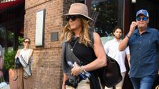Jennifer Aniston carrying The Row's Marlo Tote bag in Manhattan on August 08, 2025