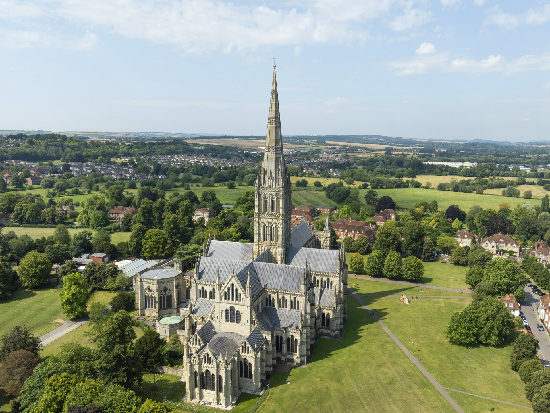 Salisbury Cathedral on a sunny day, elevated view, English countryside