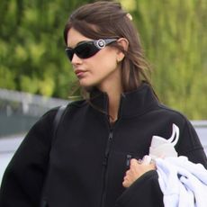 Kaia Gerber wore black leggings with chunky New Balance sneakers inspired by Hailey Bieber