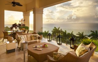 The view of Long Bay beach at sunset from a restaurant at the Quintessence Hotel in Anguilla